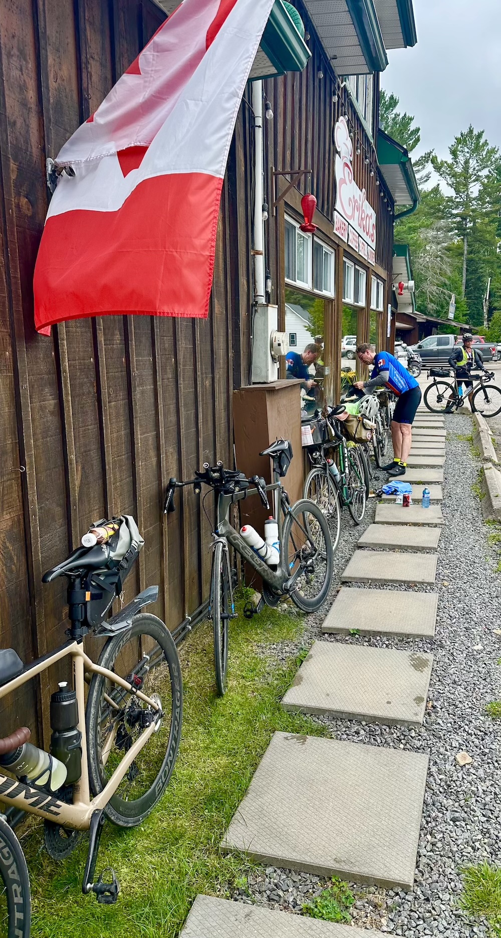 Bikes leaning against a wall at a café in Dwight, Ontario.